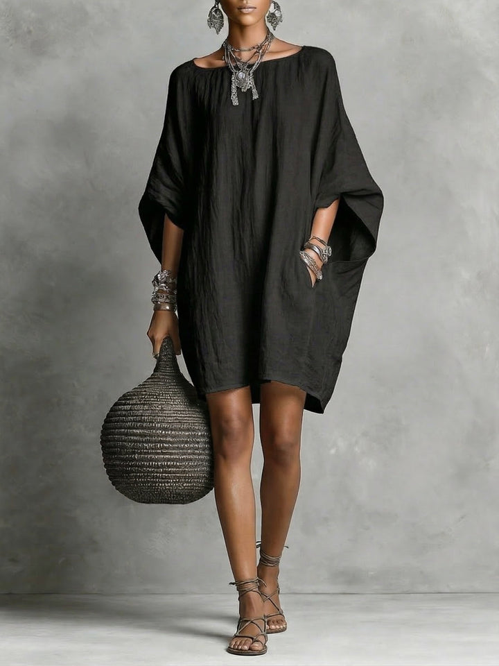 Abito da donna casual in misto cotone e lino, moda comoda e traspirante per le giornate estive.