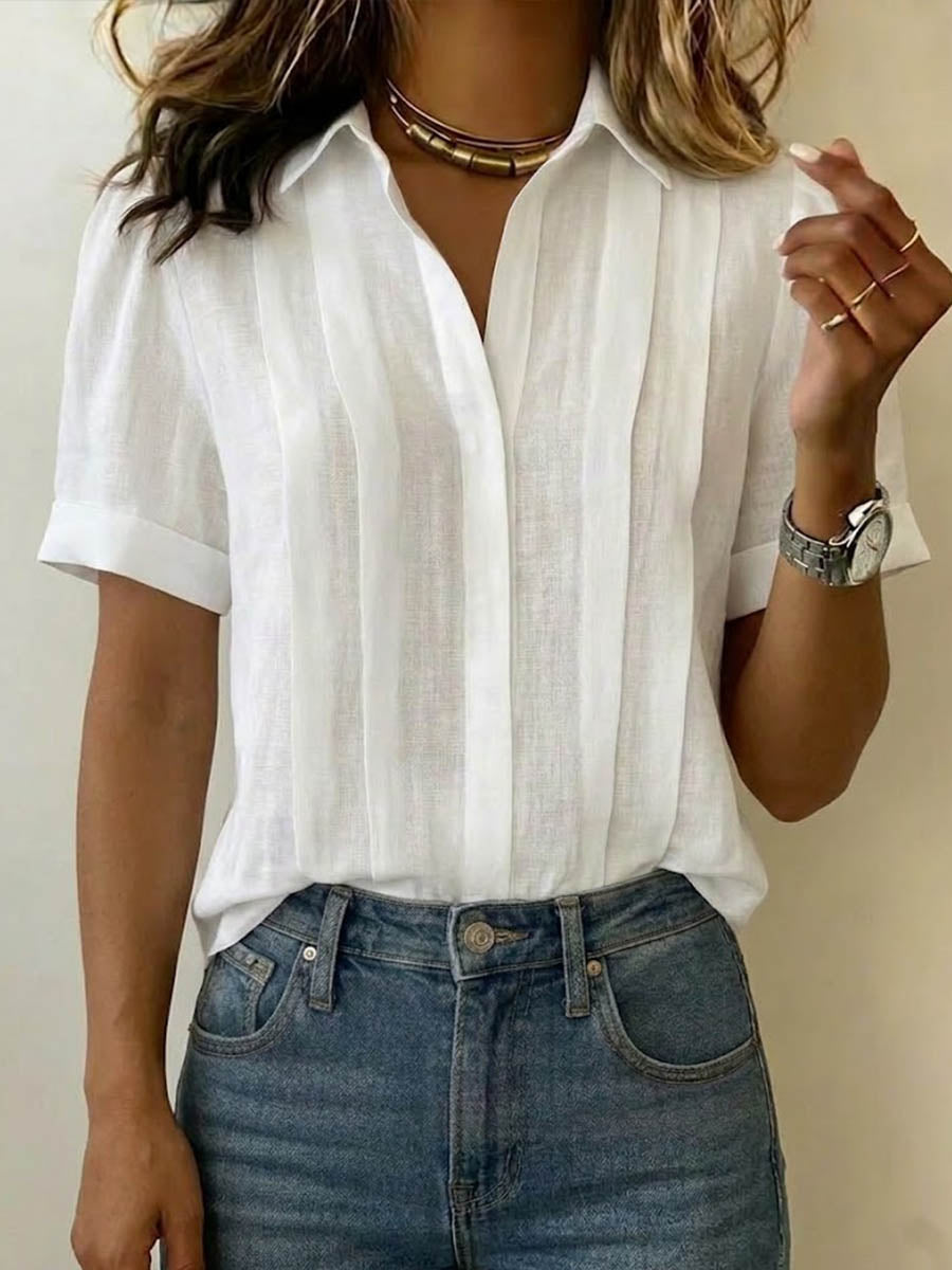 Camicia donna casual estiva con colletto e maniche corte. Morbida, leggera e traspirante per un comfort quotidiano.