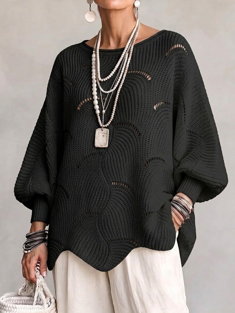 Maglione donna confortevole, traforato con design ondulato. Maniche a pipistrello per un look disinvolto.