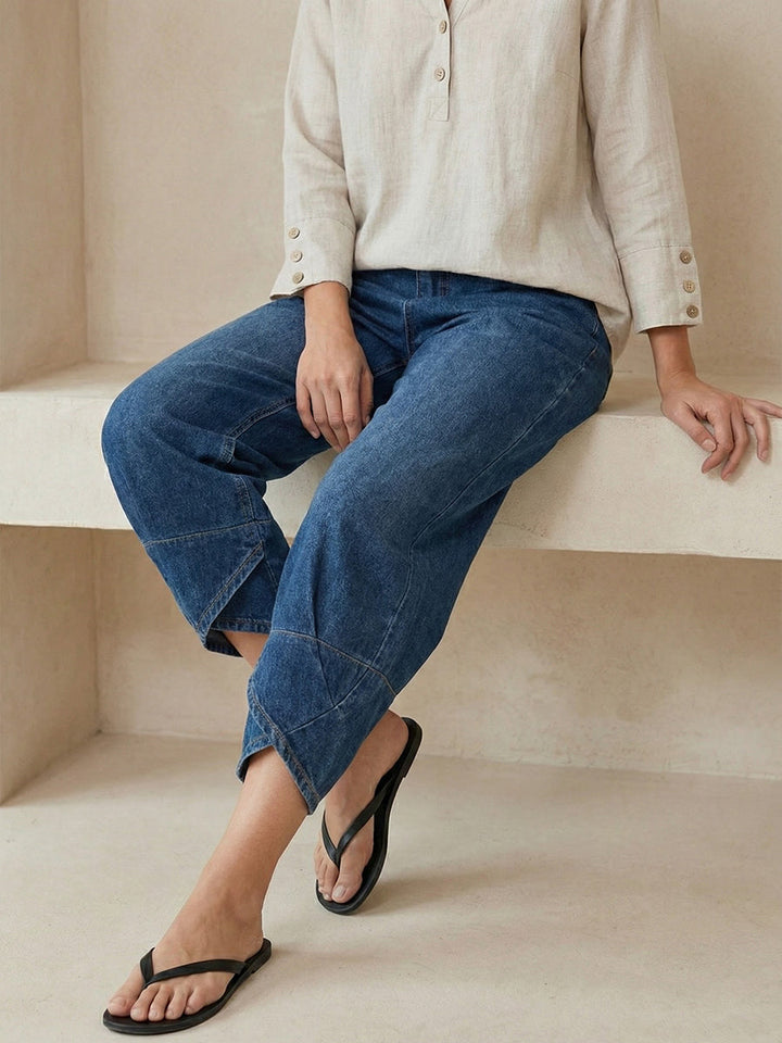 Pantaloni jeans donna a vestibilità rilassata, denim lavato blu navy per un look casual chic e comodo.