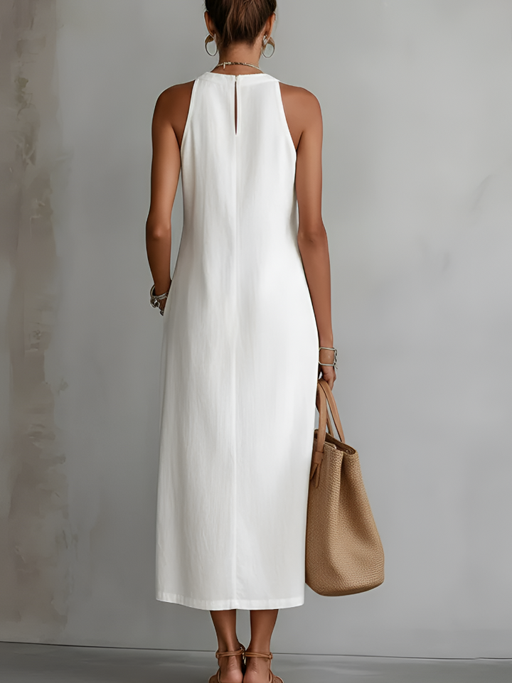 Abito maxi estivo in pizzo per donna. Vestito lungo casual chic, perfetto per vacanze e giornate al sole.