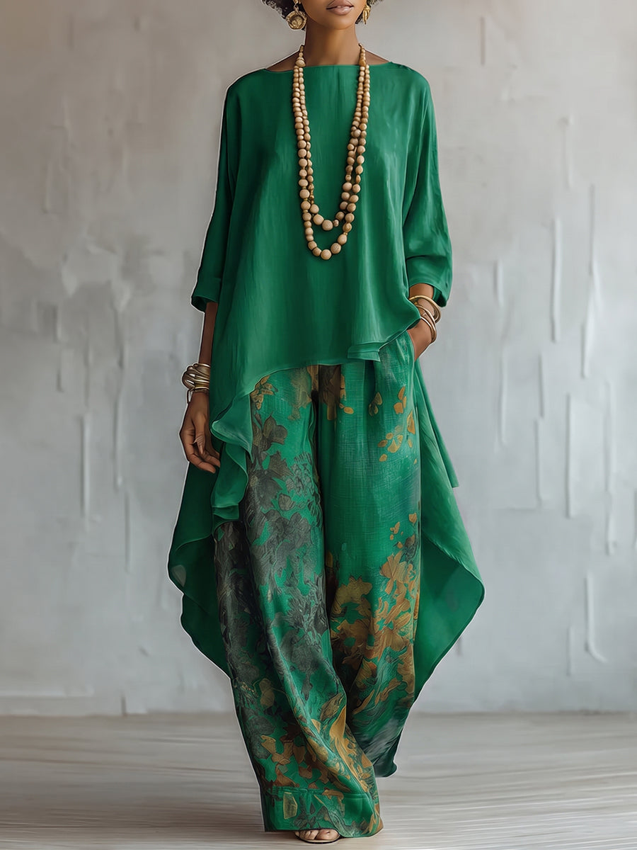 Blusa asimmetrica fluida e pantaloni palazzo floreali. Completo donna boho perfetto per l'abbigliamento vacanze.
