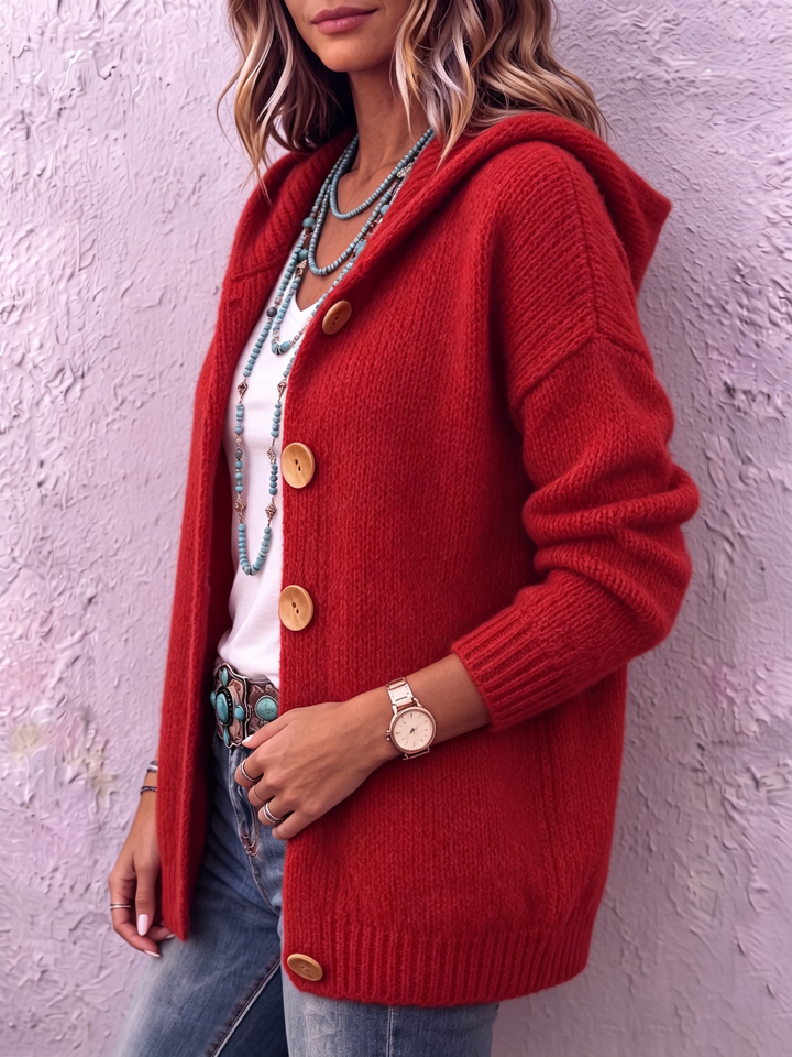 Cardigan donna a vestibilità ampia con comodo cappuccio e pratici bottoni frontali. Maglia calda e casual per moda autunnale.