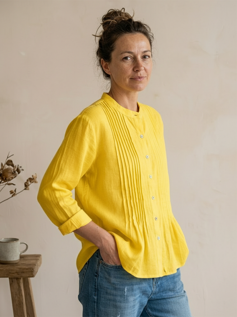 Morbida camicia donna plissettata estiva in cotone, ampia e traspirante, per massimo comfort e stile.