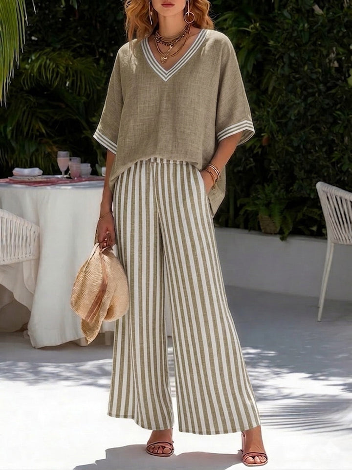 Outfit donna estivo con stile boho: completo con top patchwork e comodi pantaloni a righe per un look relax.