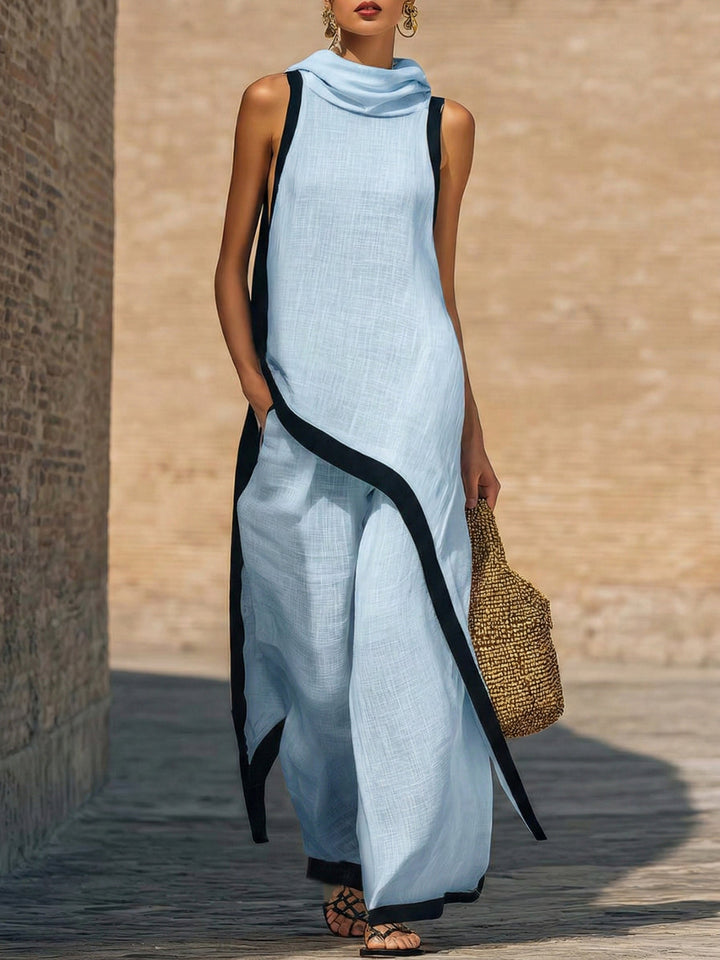 Completo donna in lino e cotone, fresco e leggero, con finiture artistiche che aggiungono un tocco di eleganza.