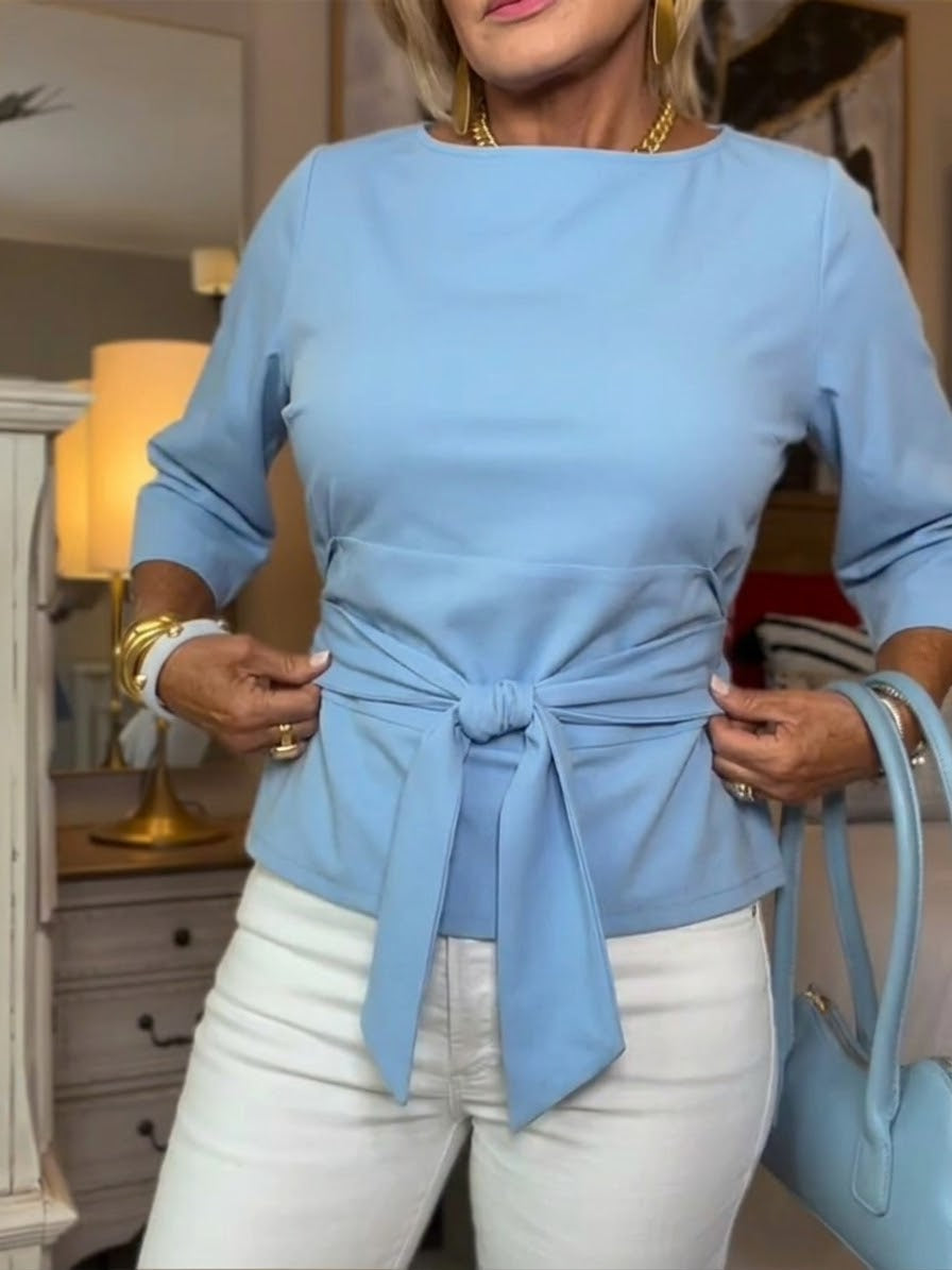 Maglietta donna azzurro chiaro, casual e confortevole, con nodo frontale per un look fresco.