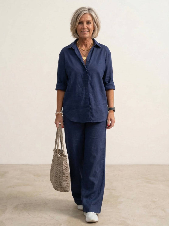 Completo donna elegante con camicia e pantaloni ampi fluidi per un look estivo chic.