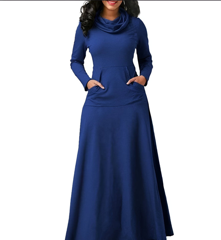 Abito fluido donna con maniche lunghe, design elegante per l'autunno inverno. Vestito comodo e alla moda.