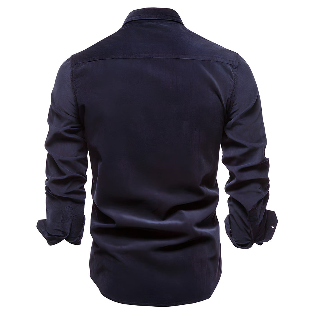 Camicia uomo blu navy a maniche lunghe, stile utility con tasche. Perfetta per comfort e look casual versatile.