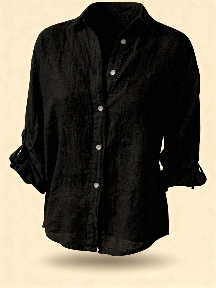 Moda donna: camicetta oversize a maniche lunghe, versatile per outfit quotidiani chic.