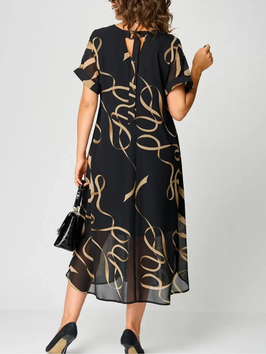 Elegante abito midi stampato da donna, scollo a V e maniche kimono. Versatile per estate, look casual o occasioni speciali.