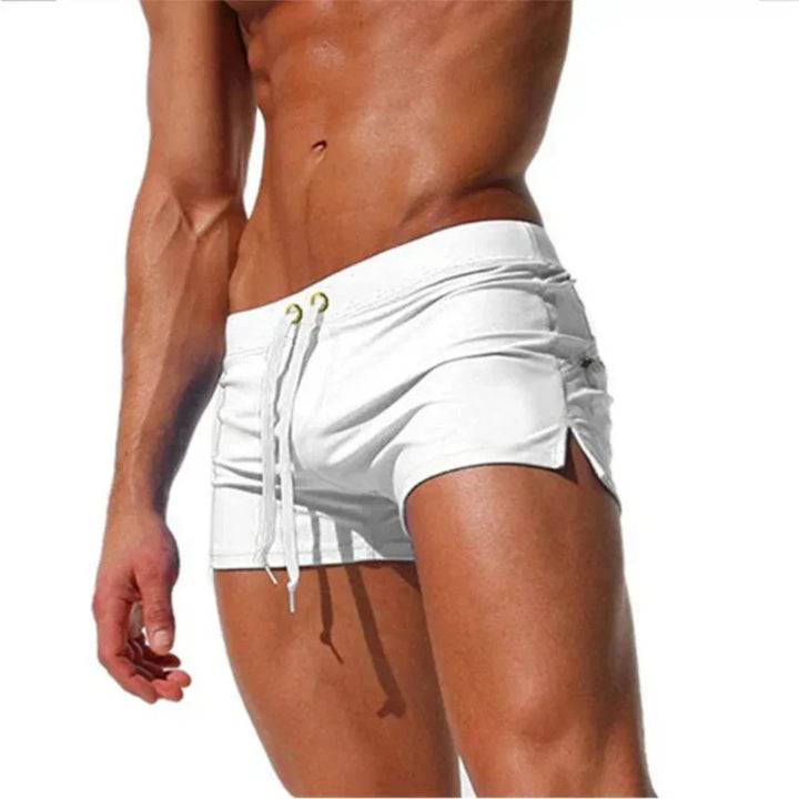 Shorts da bagno uomo per sport acquatici, design sportivo con pannelli laterali a contrasto, asciugatura veloce.