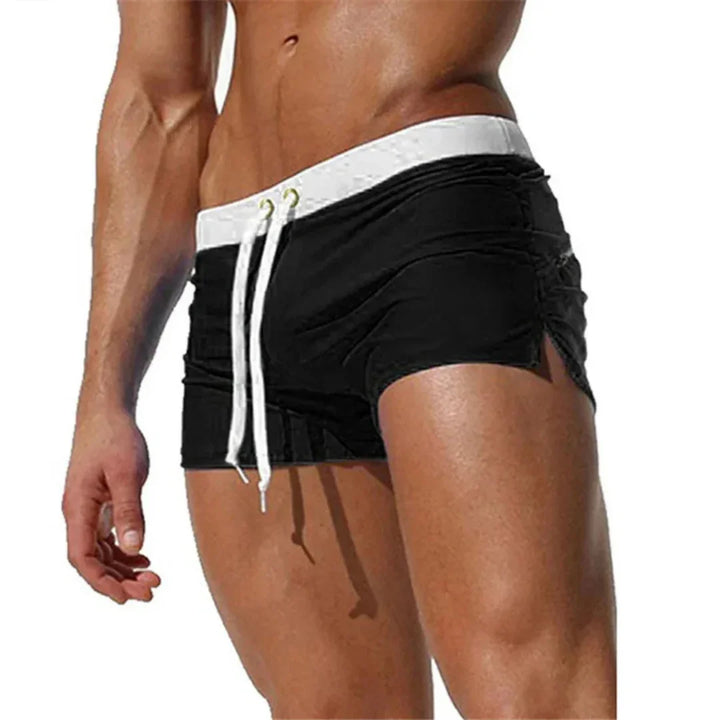 Shorts da bagno maschili con pannelli a contrasto. Perfetti per sport acquatici, asciugano in fretta.