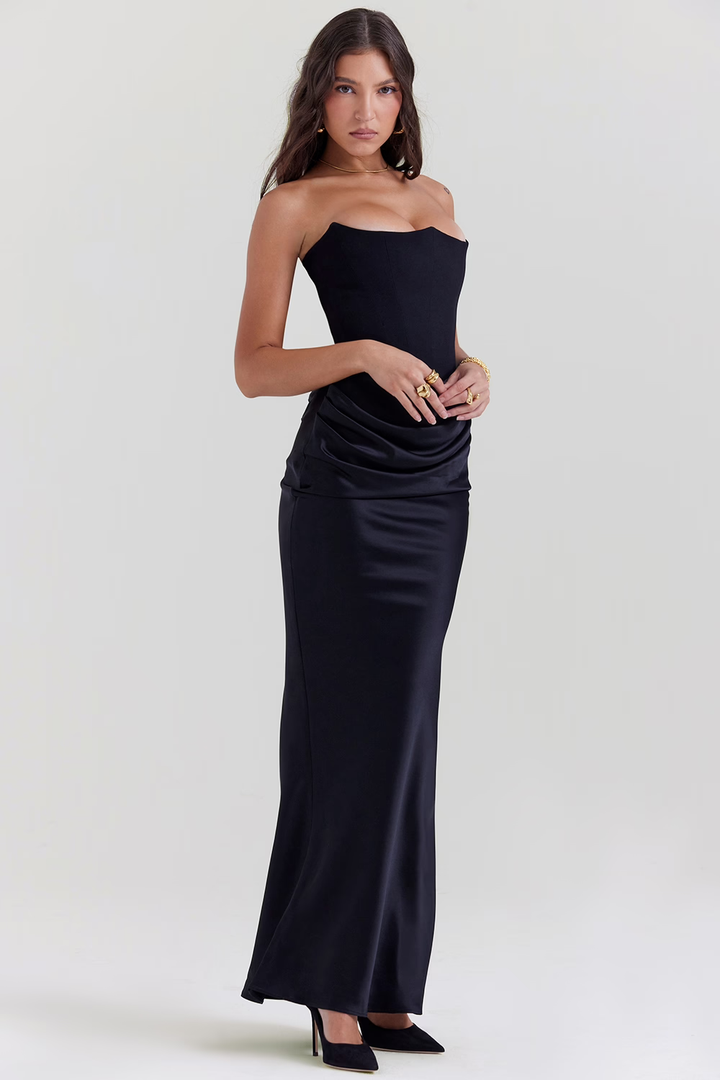 Vestito donna autunnale lunghezza midi, con vita a corsetto che slancia la figura. Perfetto per un look chic.