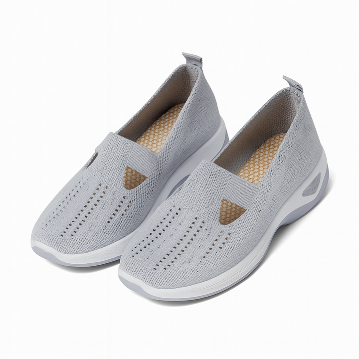 Scarpe da camminata slip-on da donna nere con suola antiscivolo per comfort quotidiano e versatilità estiva.