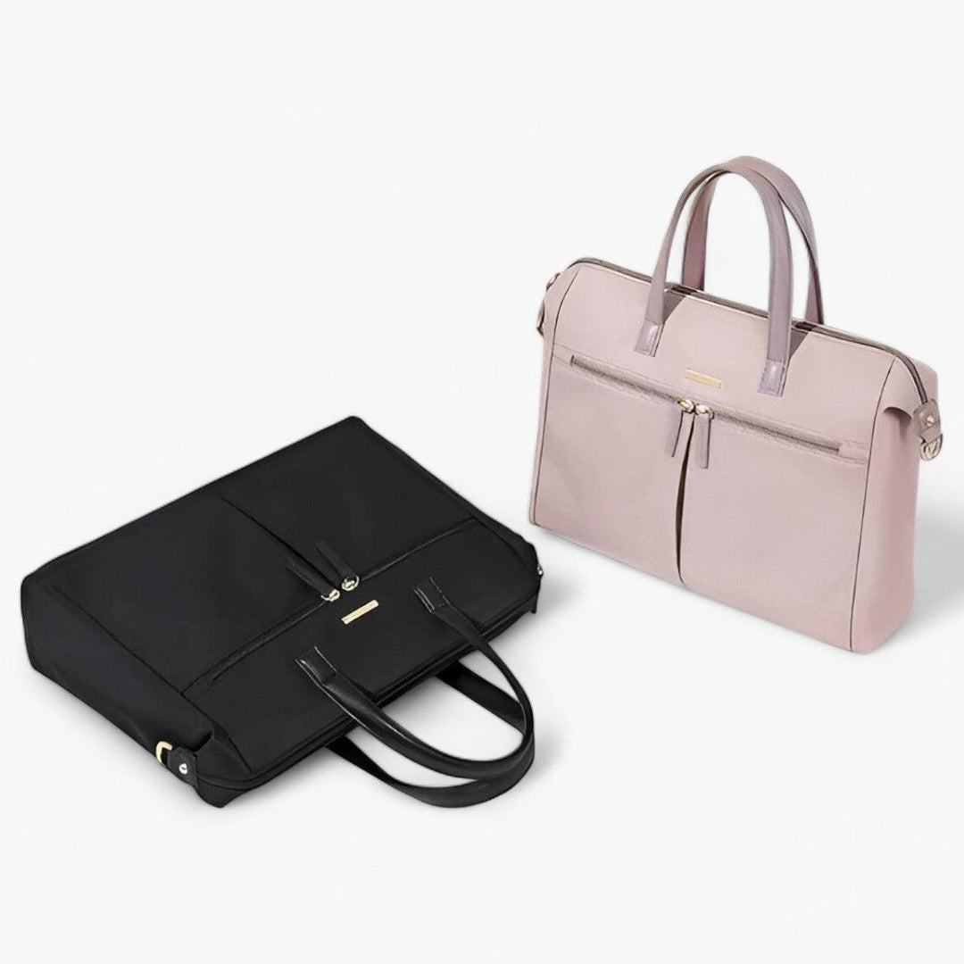 Elegante borsa porta laptop da donna con tracolla regolabile, ideale per l'ufficio e per viaggi di lavoro.