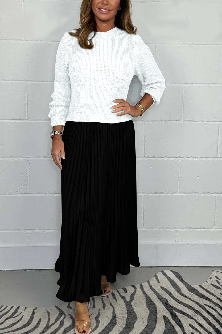 Abbigliamento femminile: completo donna invernale due pezzi. Maglione in maglia e gonna plissé in raso. Moda.