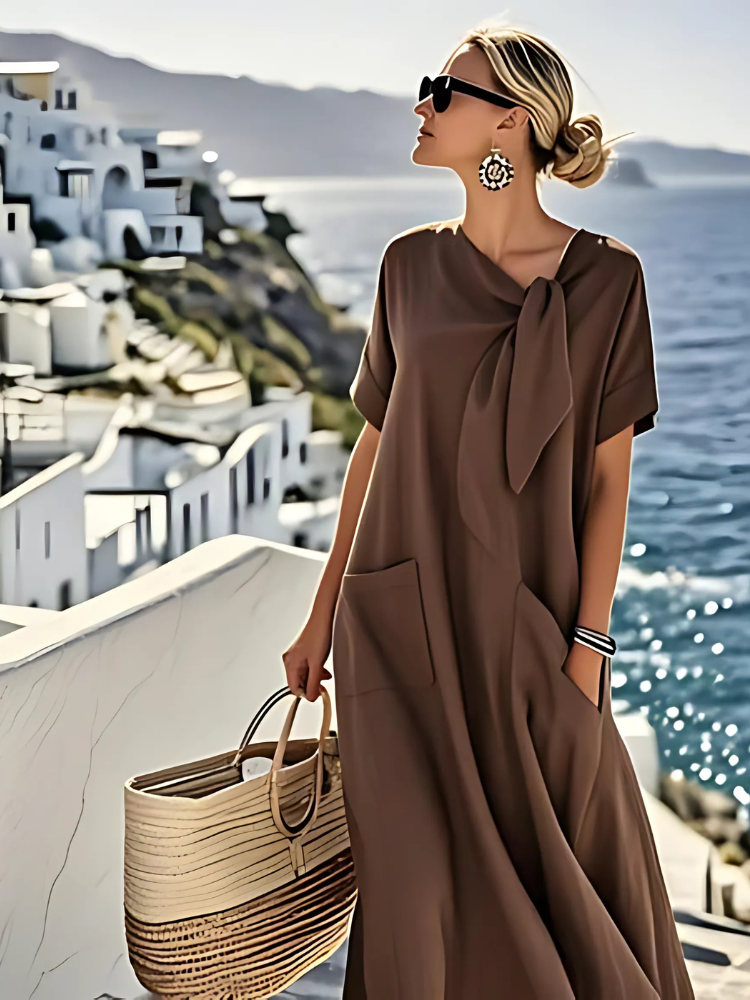 Abito donna elegante con tasche, design moderno e confortevole, perfetto per uno stile versatile dal giorno alla sera.