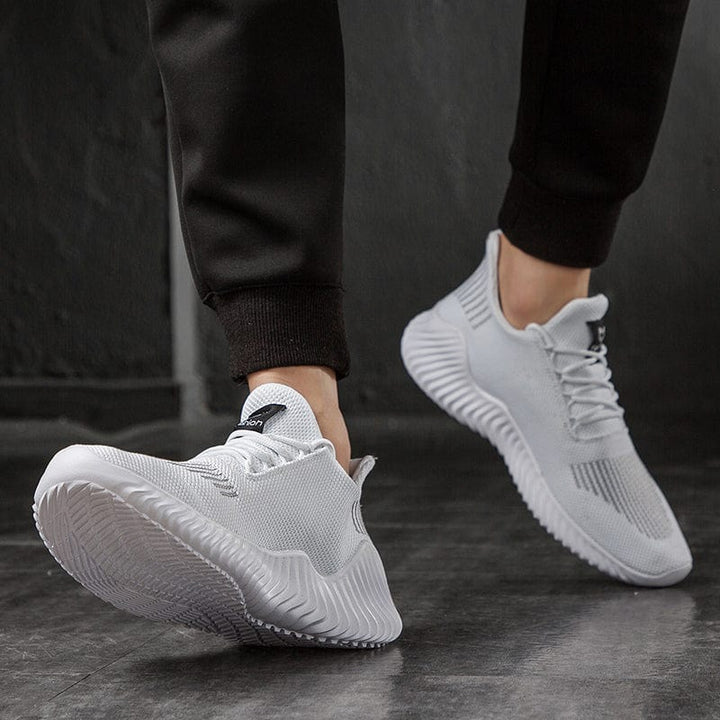 Sneakers da uomo senza lacci, comode e leggere. Scarpe slip-on traspiranti ideali per il tempo libero e passeggio.