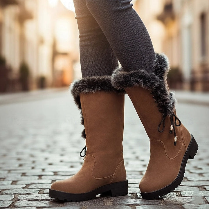 Stivali invernali donna con morbida pelliccia sintetica, suola antiscivolo. Perfetti per il freddo.