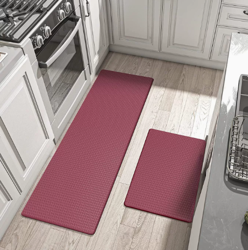 Tappetino cucina ergonomico antifatica, offre comfort e sostegno, superficie antiscivolo.