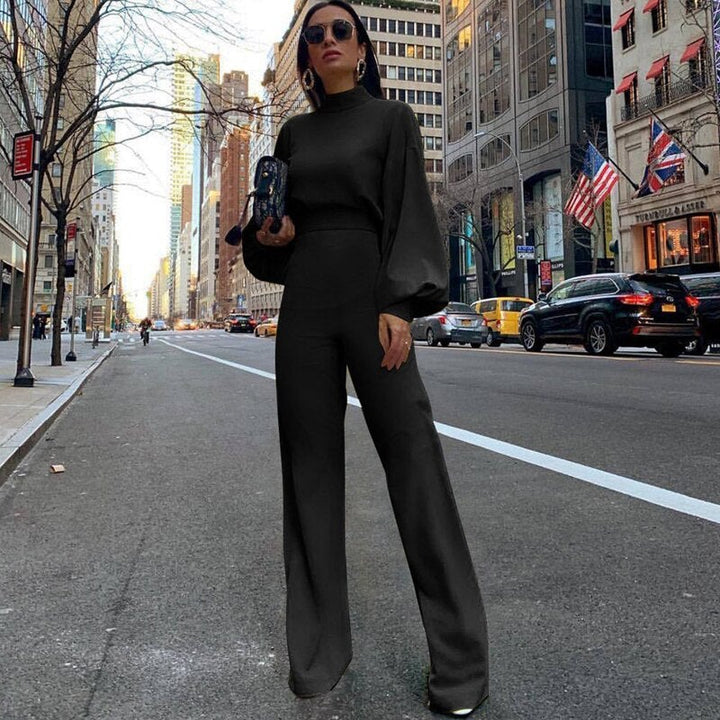 Tuta donna completa, stile casual chic o outfit ufficio. Moda sofisticata con colletto in piedi.