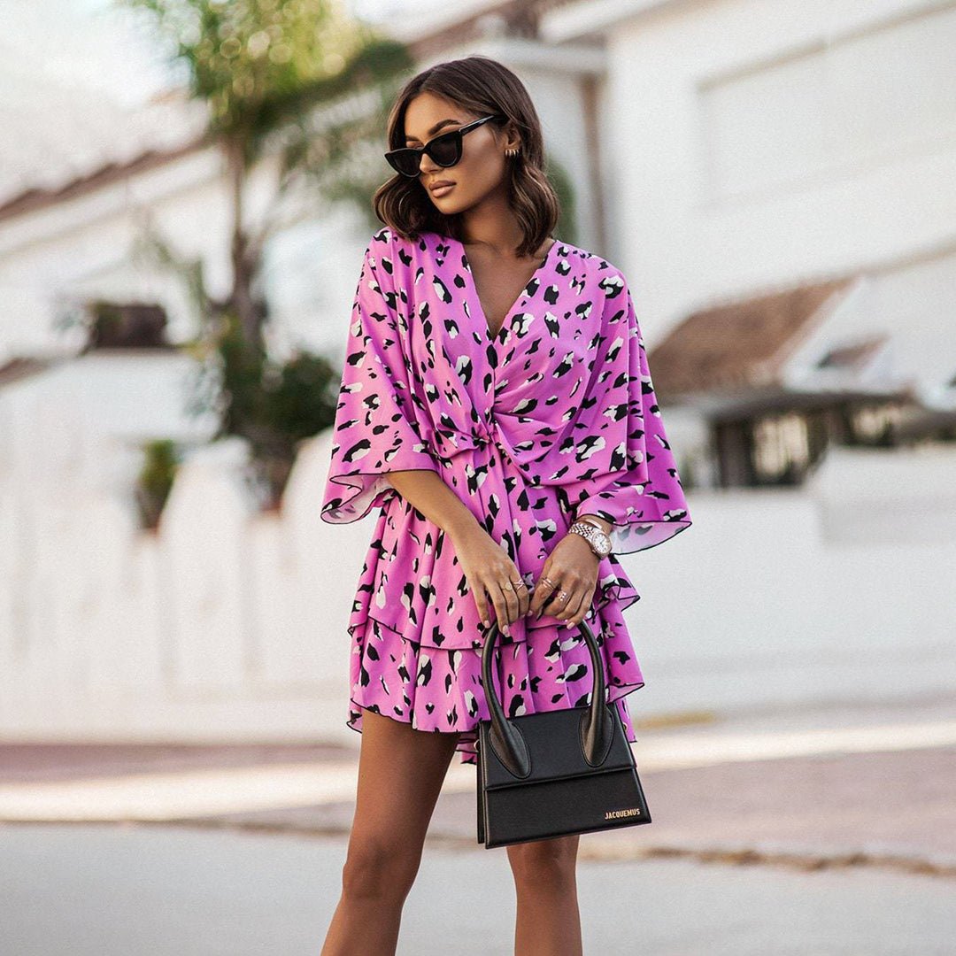 Abito da sera elegante donna con scollo a V. Ideale per eventi chic, matrimoni o cene. Abbigliamento femminile.