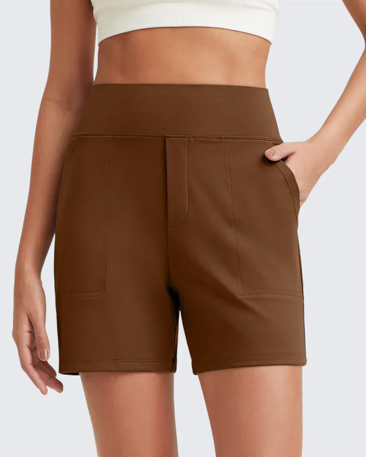 Pantaloncini neri donna vita alta, tasche profonde, versatili per ogni occasione e moda estiva.