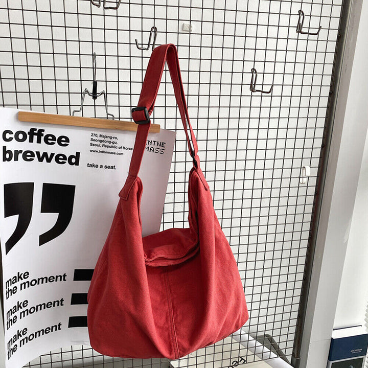 Elegante borsa a tracolla da donna in tessuto resistente, versatile accessorio moda per spalla o crossbody.