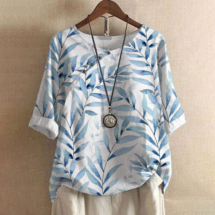 Camicia da donna floreale a maniche lunghe, versatile e stampata. Blouse elegante per primavera ed estate.