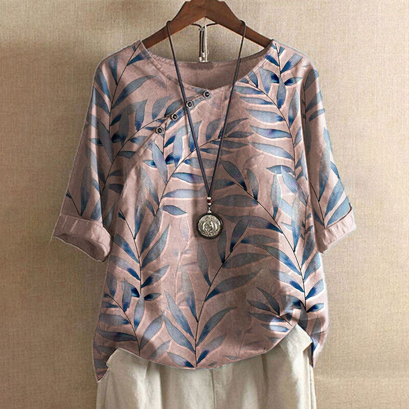 Elegante camicia floreale da donna, maniche lunghe, motivo vivace. Perfetta per moda primavera-estate casual.