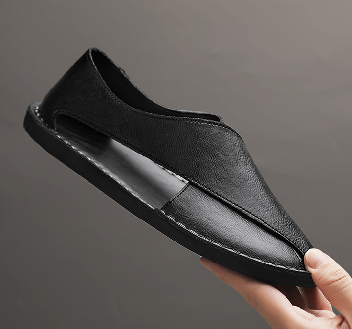 Sandali uomo artigianali stile Peshawari con design incrociato. Scarpe estive comode, moda maschile casual-elegante.