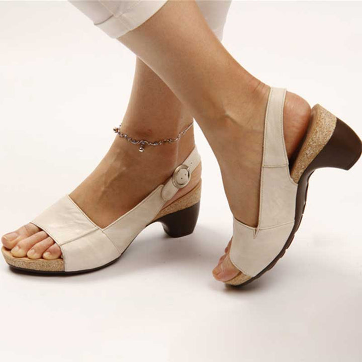 Sandali donna comodi con tacco largo, design elegante e supporto plantare integrato. Calzature estive perfette.
