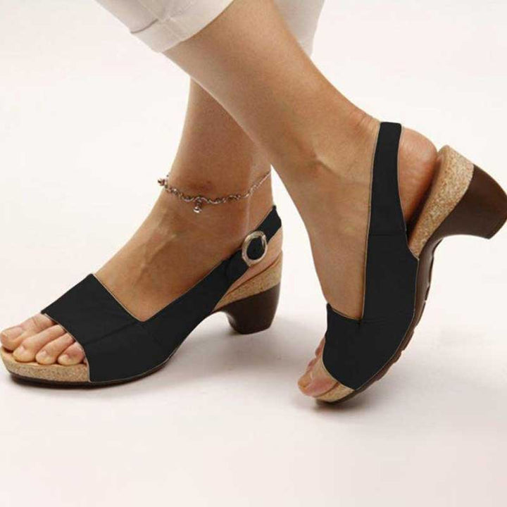 Eleganti sandali donna ortopedici con tacco largo stabile e cinturino regolabile, ideali per calzature estive comode.
