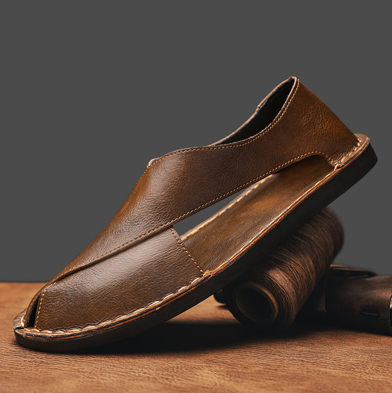 Sandali uomo stile Peshawari artigianali con design incrociato. Perfetti per l'estate, comfort e moda maschile.