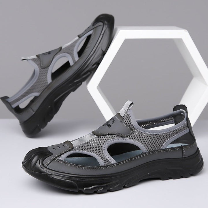Scarpe aperte uomo, design ergonomico e traspirante. Sandali ideali per comfort estivo e piedi sani.