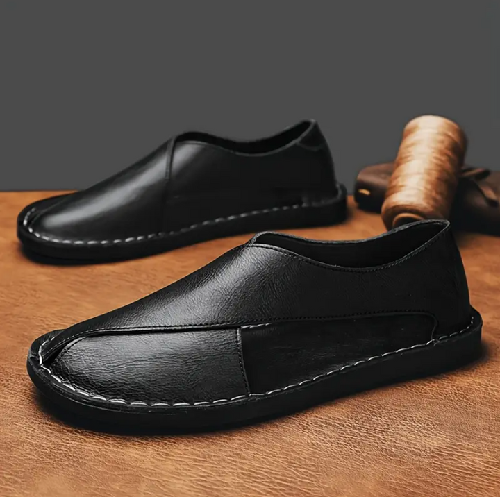 Sandali uomo stile Peshawari. Design incrociato unico, calzature artigianali, nero o arancio, ideali per l'estate.