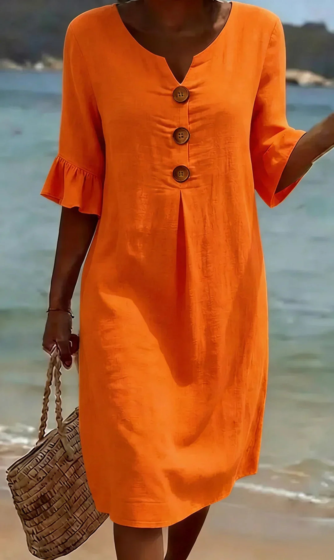 Vestito midi primaverile/estivo donna con scollo a V e maniche a volant, leggero e alla moda per la bella stagione.