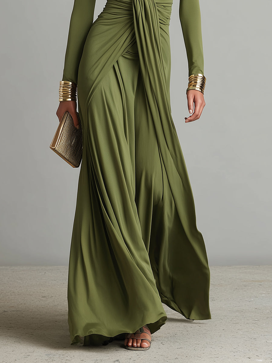 Abito lungo da donna verde smeraldo con design incrociato, scollo a V e maniche lunghe, per un look raffinato.