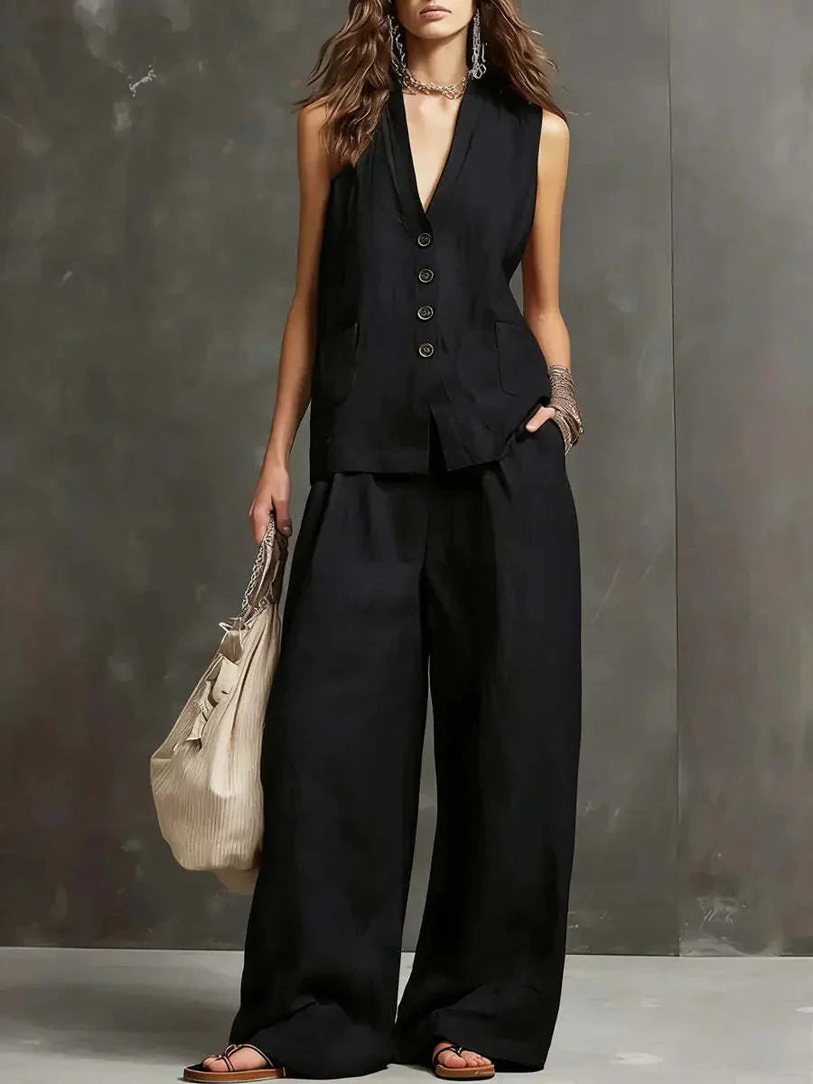 Completo elegante donna con gilet e pantaloni a gamba larga. Look coordinato perfetto per primavera estate.