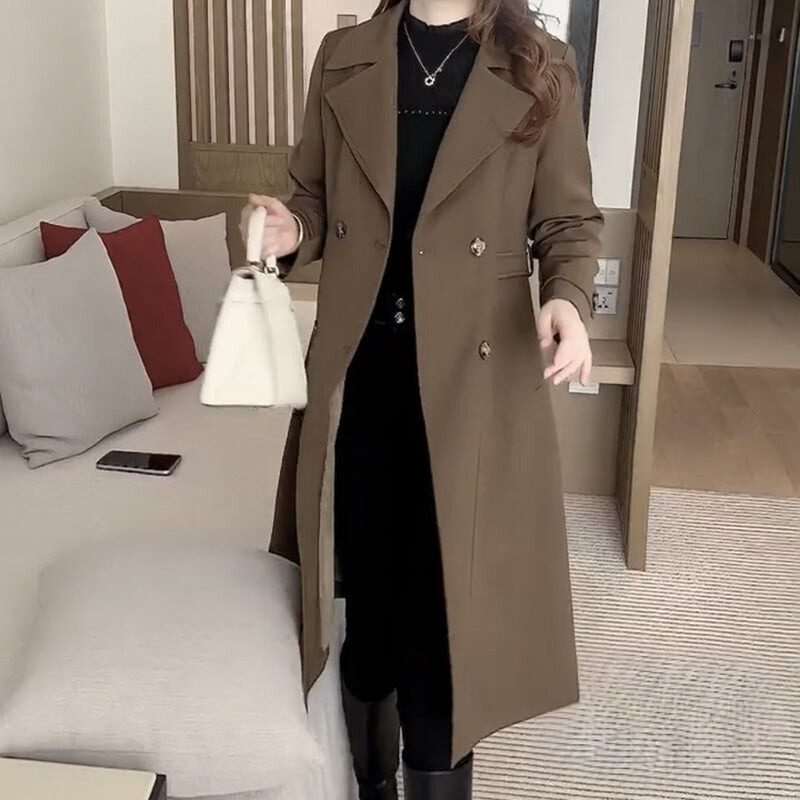 Soprabito trench donna versatile nero, perfetto per l'abbigliamento casual e ufficio in mezza stagione.