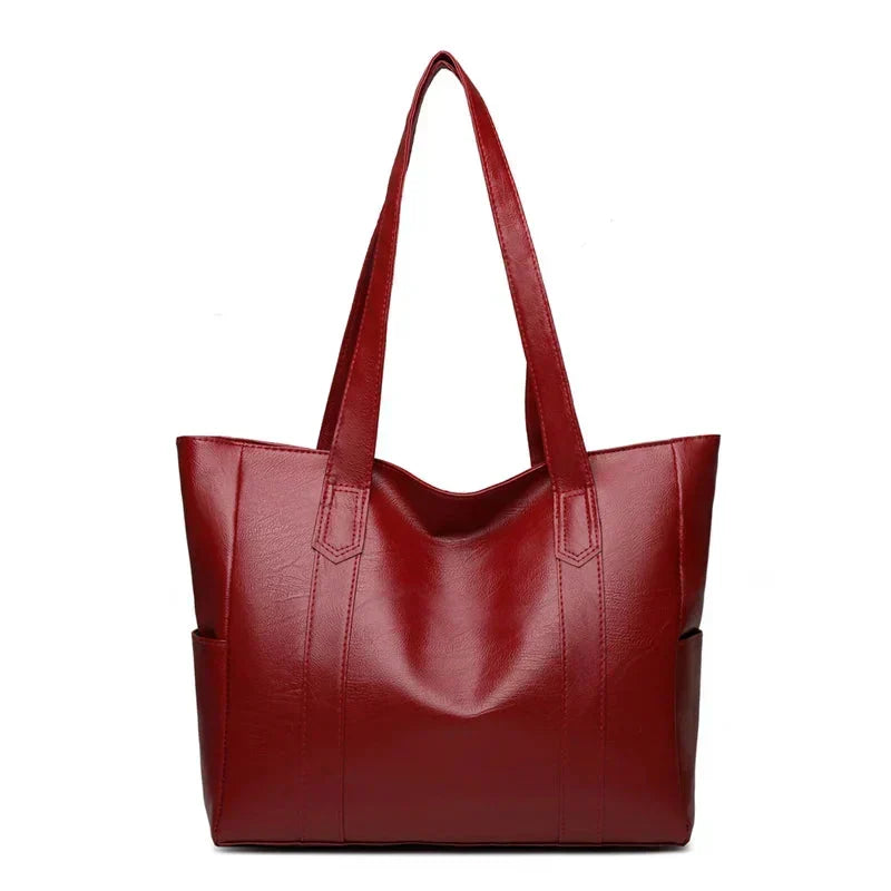 Profilo borsa a spalla donna in vera pelle. Linee pulite ed essenziali, un classico senza tempo.