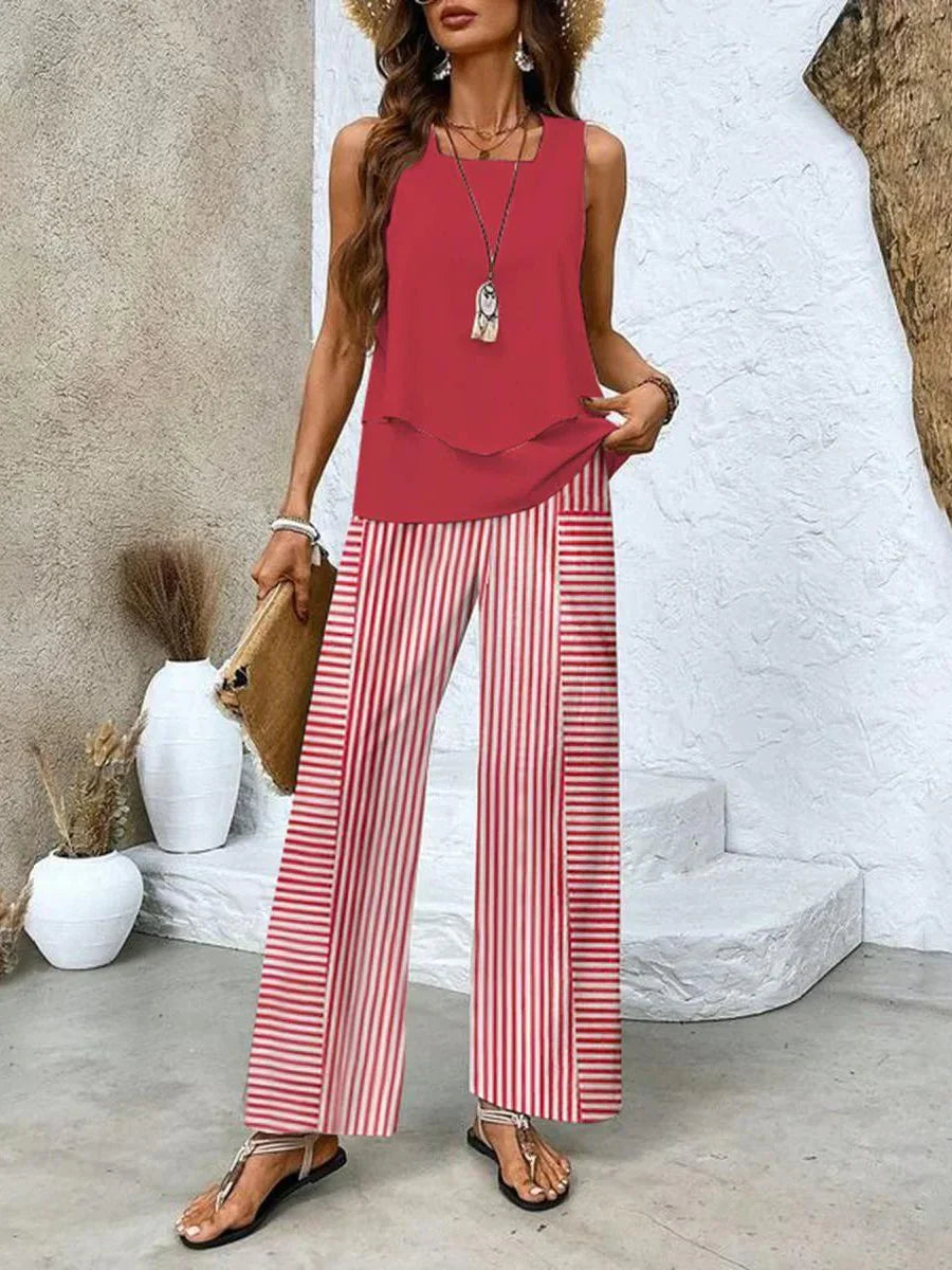 Set donna estivo con top scollo quadrato e pantaloni a righe fluidi. Abbigliamento moda donna casual chic.