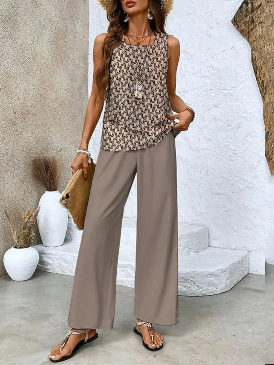 Outfit coordinato donna a righe: top scollo quadrato e pantaloni fluidi. Perfetto per un look estivo casual chic.