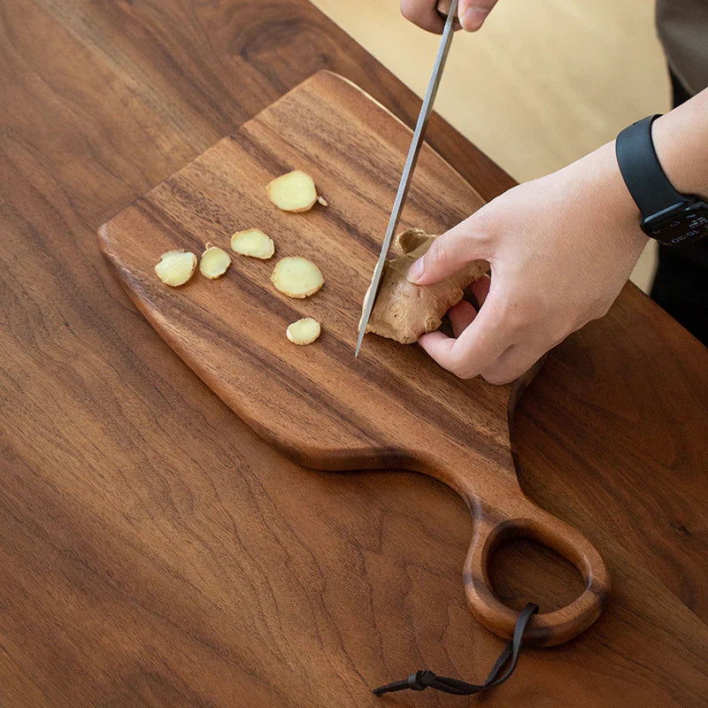 Taglieri in legno di noce sostenibile, set da 2 per tagliare alimenti o come vassoio da portata resistente.