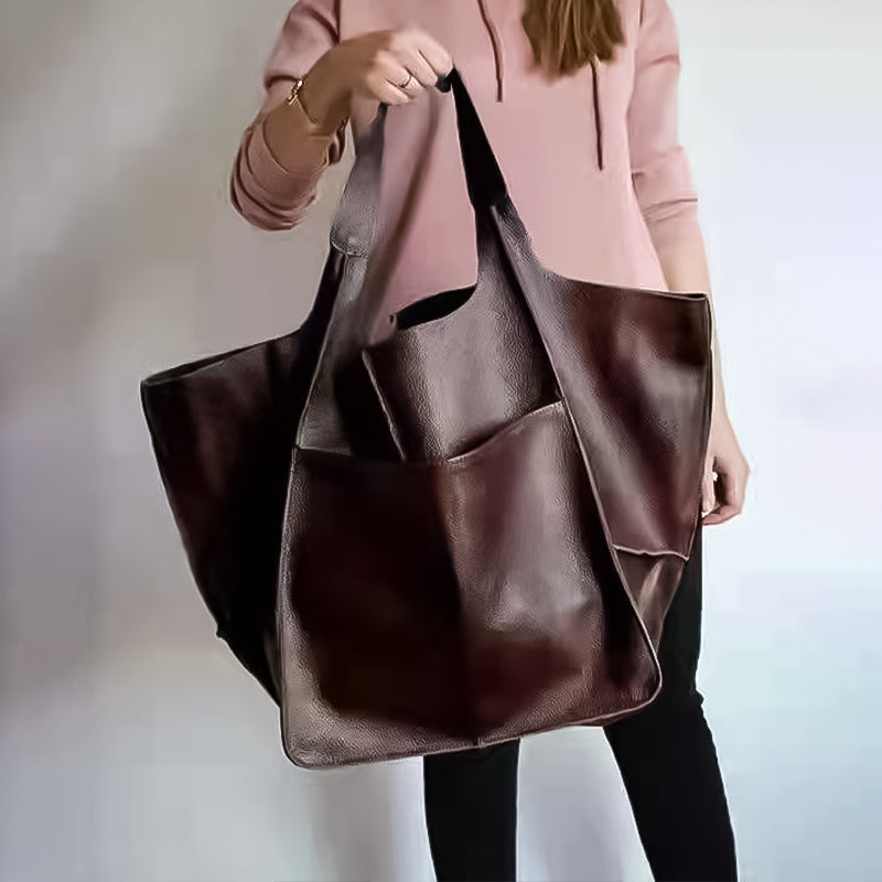 Elegante borsa a tracolla oversize da donna in pelle vintage di qualità, spaziosa e funzionale per ogni outfit.