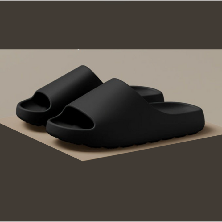 Sandali slide unisex moderni e ammortizzati, con supporto arco. Ideali per comfort estivo, relax e recupero post-attività.