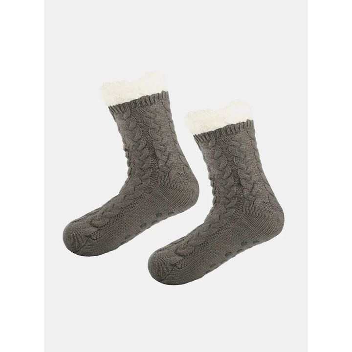 Soluzione antiscivolo: calze unisex con suola grip per prevenire scivoloni, comfort garantito.