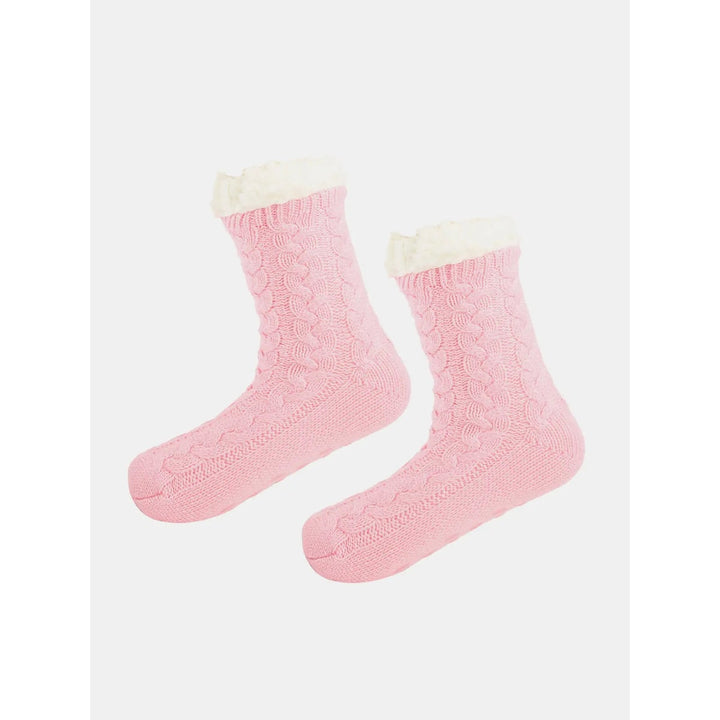 Calze antiscivolo unisex con grip, ideali per uso ospedaliero, garantiscono sicurezza e igiene.